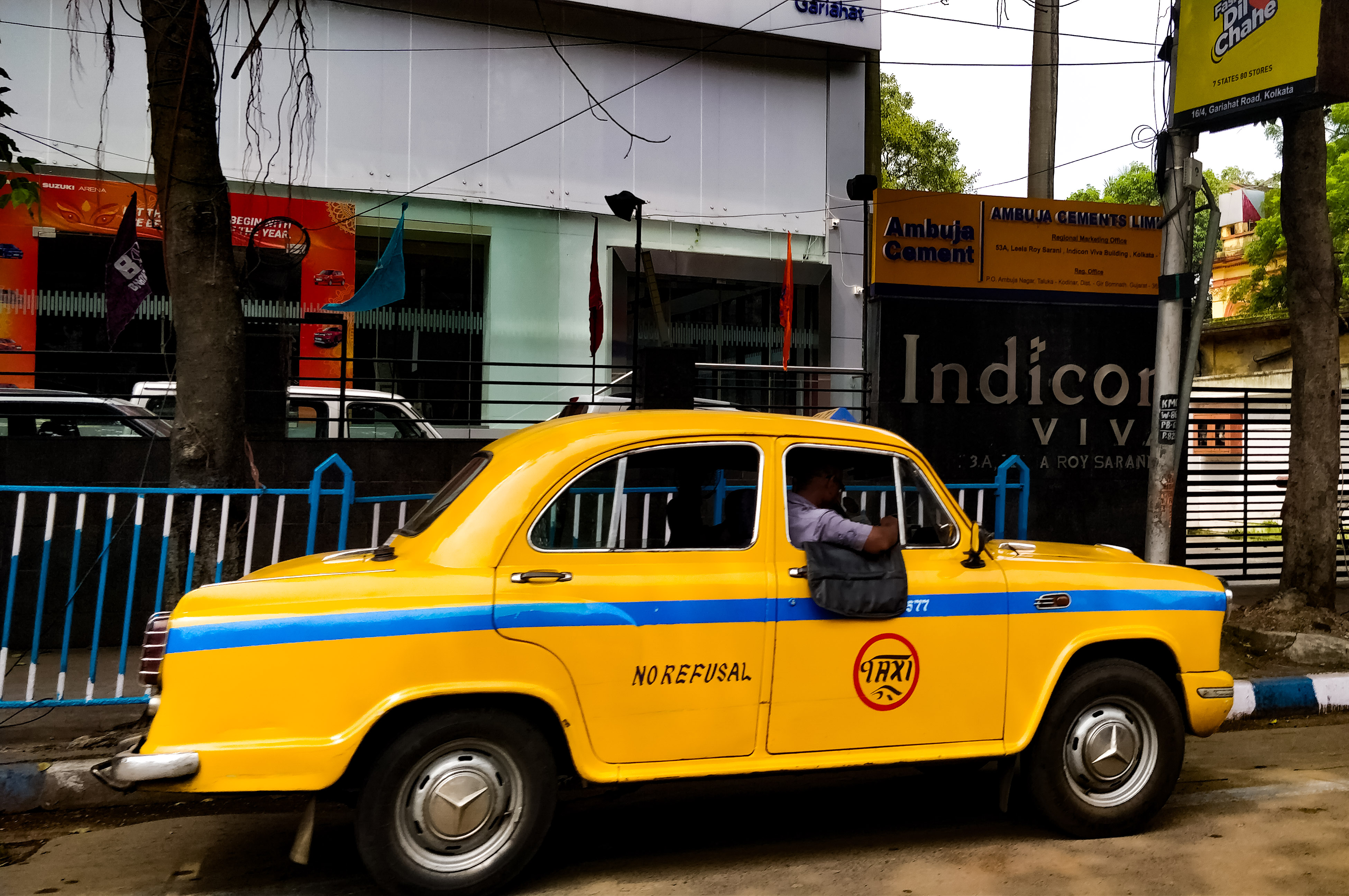 Kolkata's signature yellow Ambassador taxis are a great way to get around the city